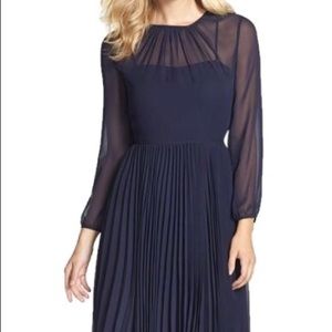 Navy blue dress with sheer top with pleated bottom